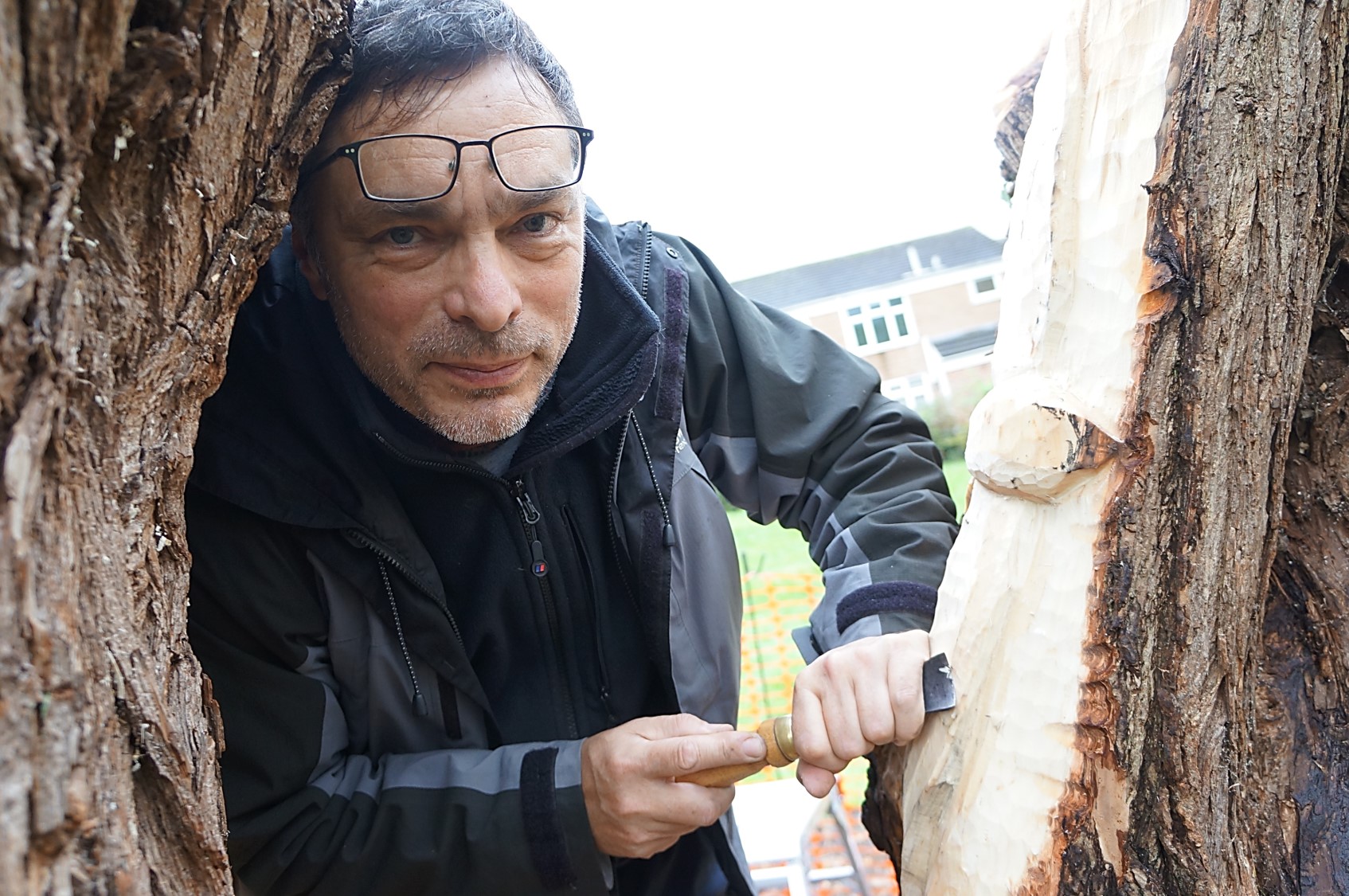 Keith Ashford carving wood